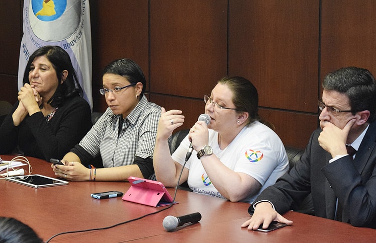 Organizaciones durante el foro en la Facultad de Jurisprudencia de la Universidad Católica.